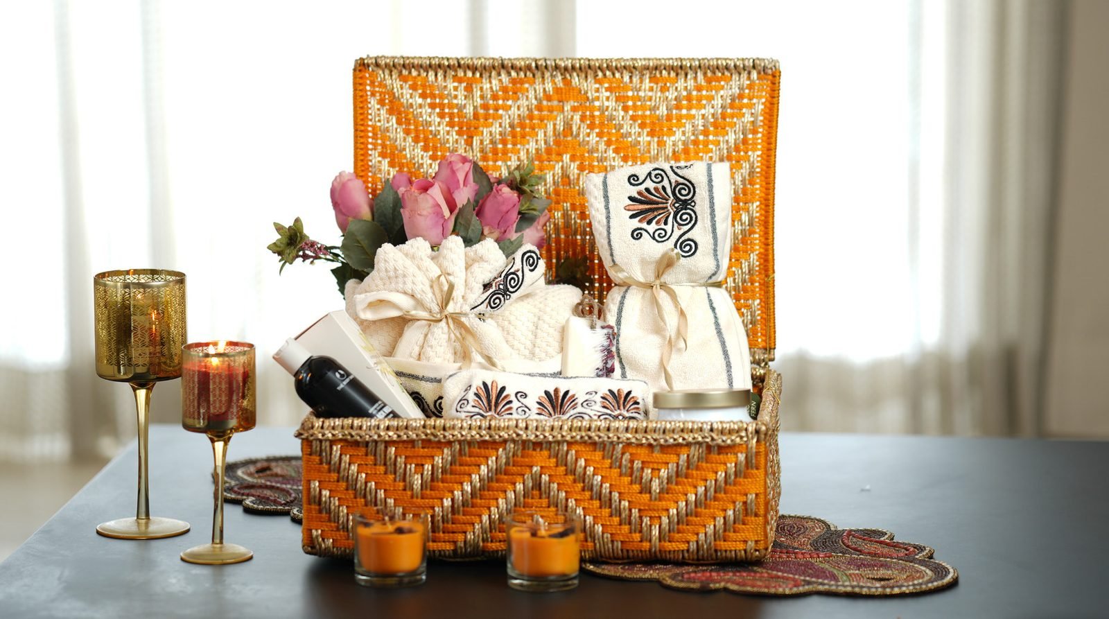 Lid basket gift hamper with candle and sweets