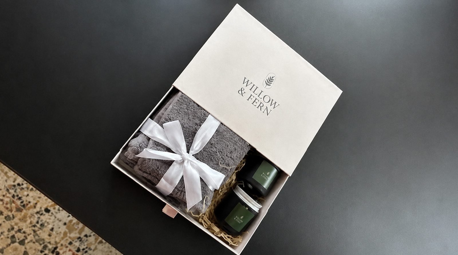 Slider box with face towels and candles